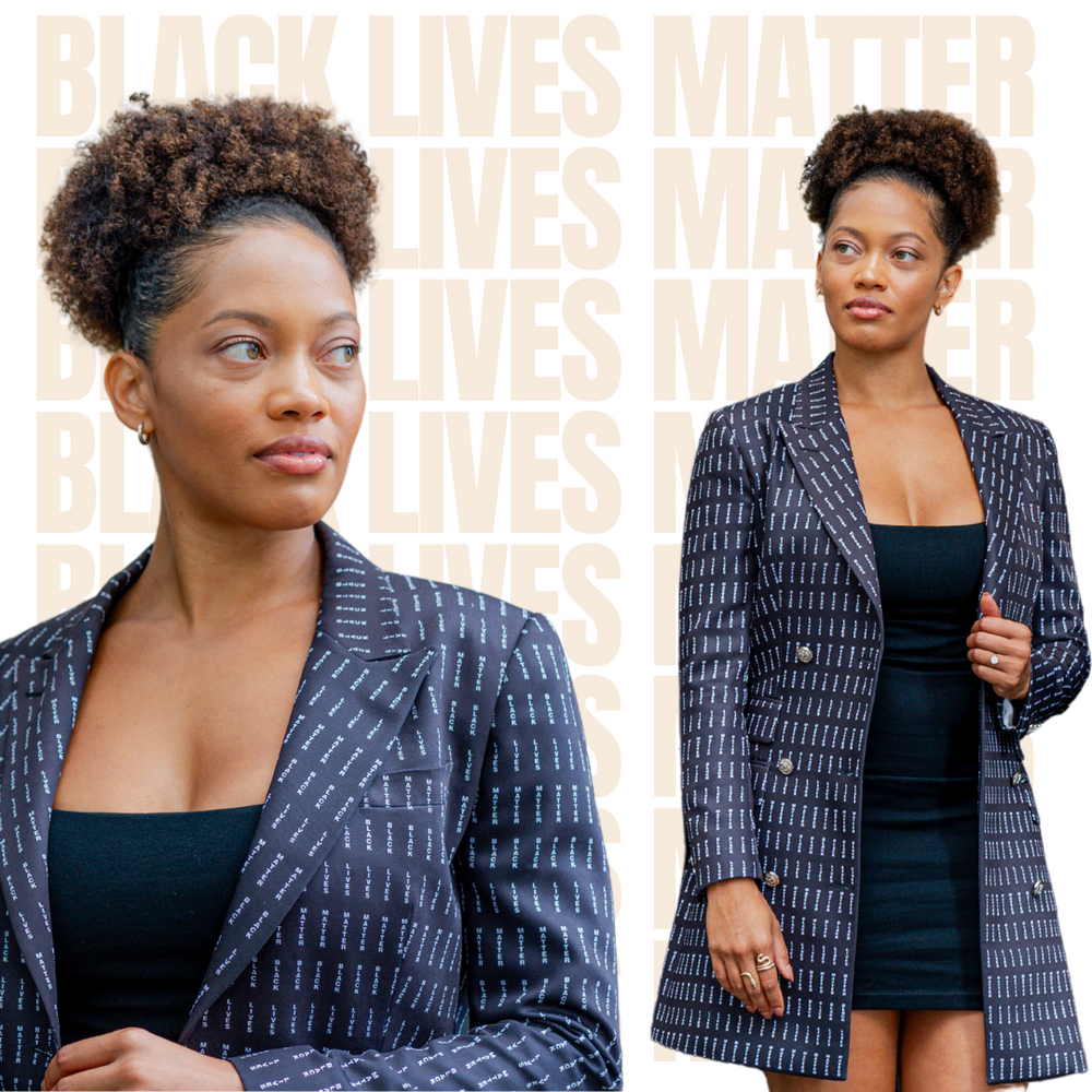 Sydney Chestnut wearing a dark blazer with BLACK LIVES MATTER lettering