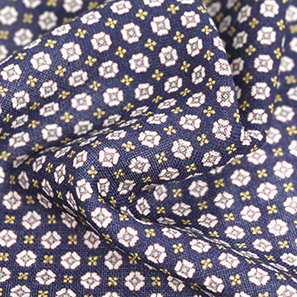 Blue fabric with a repeating floral pattern