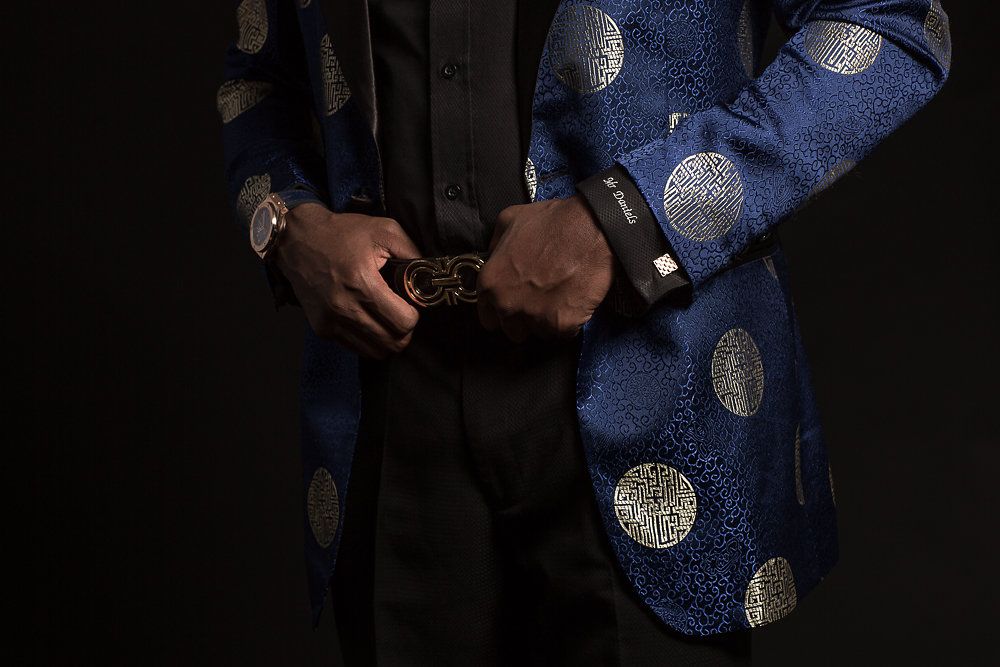 Close-up of decorative jacket cuff buttons and patterned lining